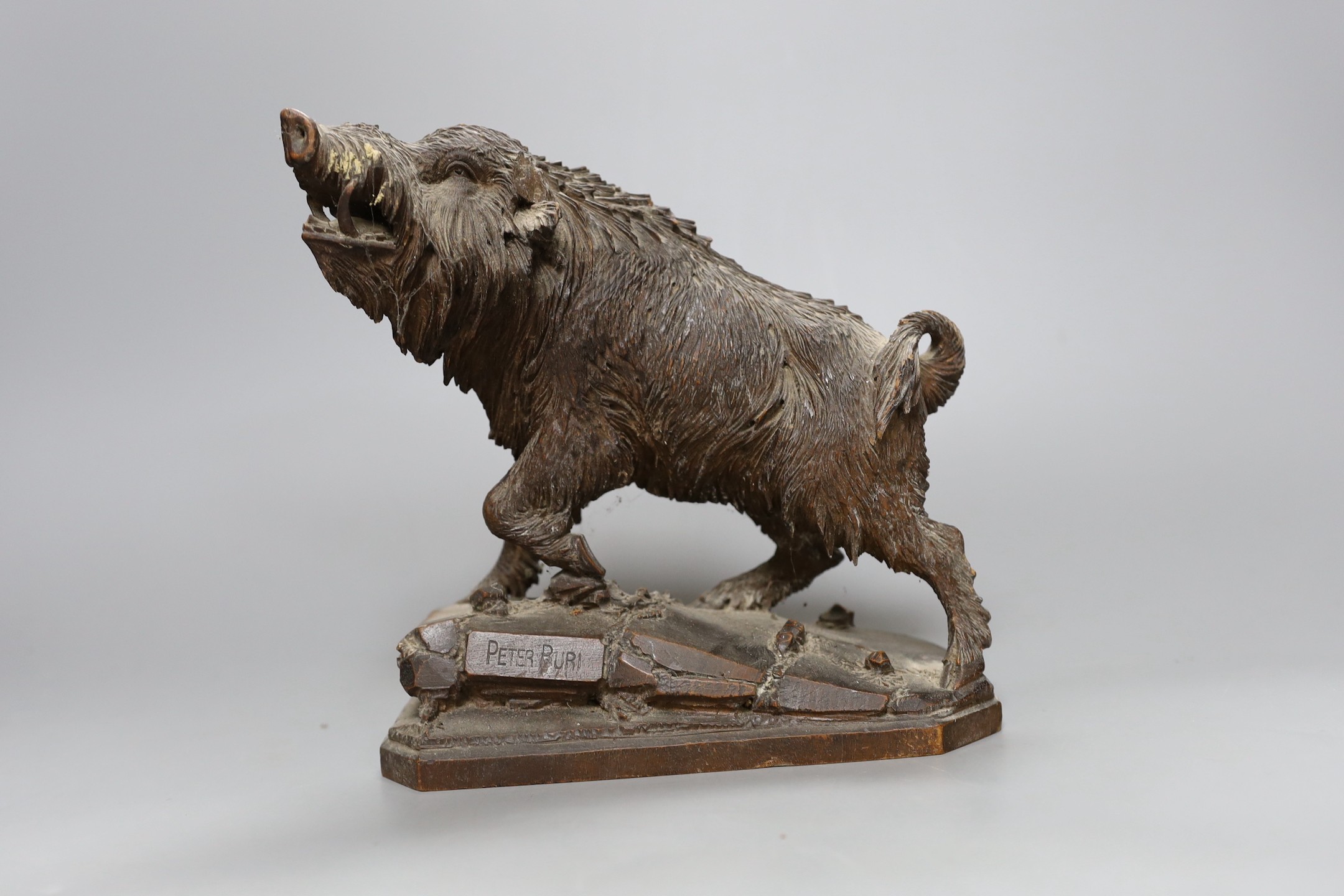 A Black Forest carved wood figure of a Wild Boar, signed Peter Buri, 19.5cm